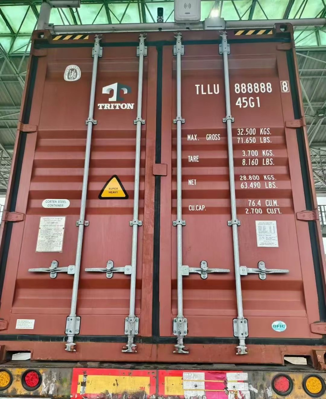 Doors of a high-cube container showing its weight and volume markings