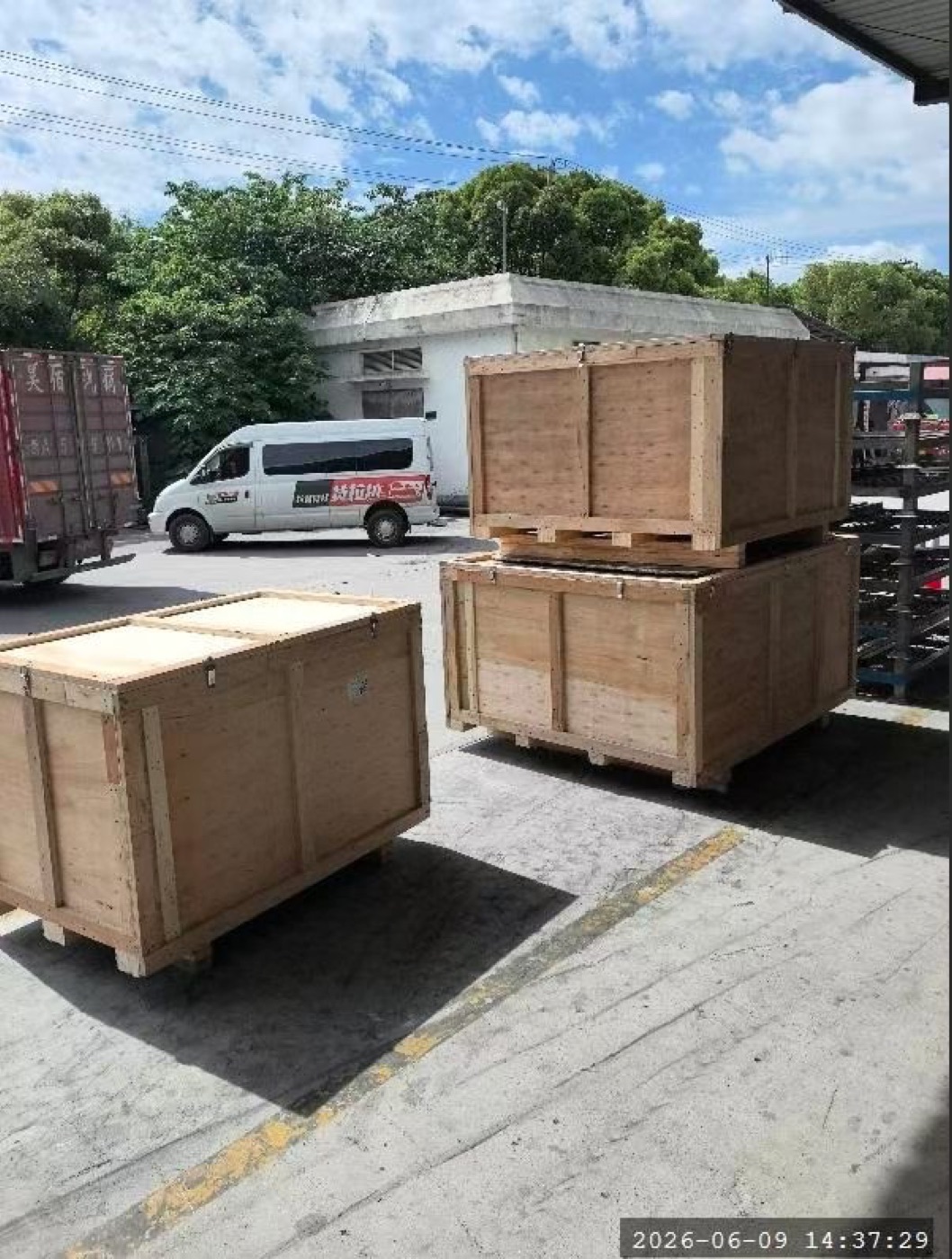 Wooden export crates holding machinery, ready for loading